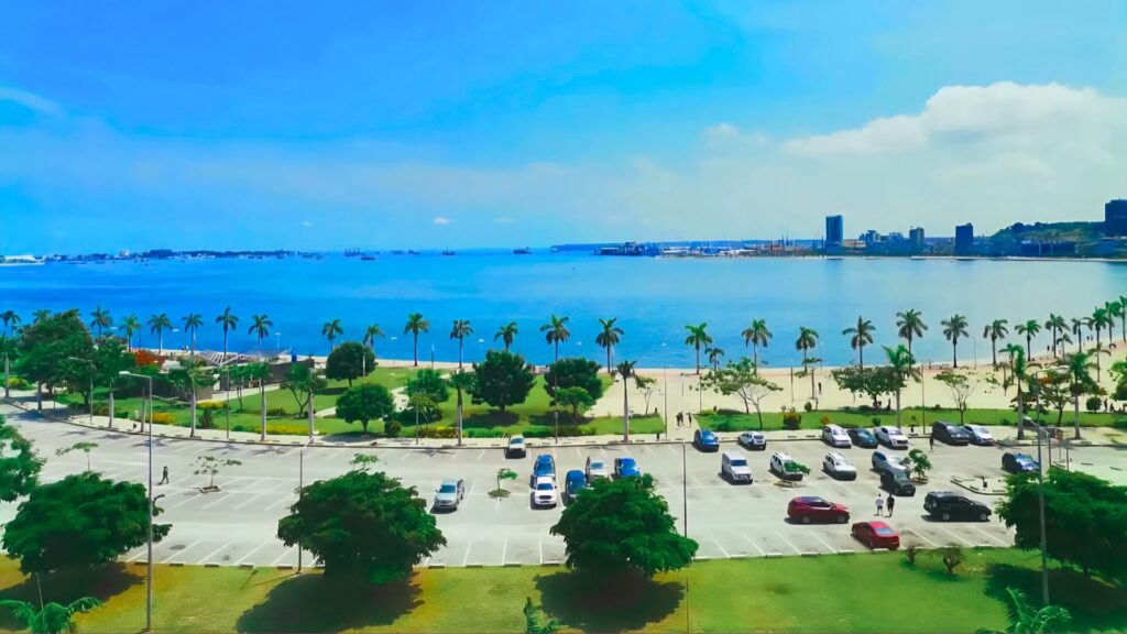 View of Luanda Bay with palm trees, gardens, and a peaceful seafront promenade – a perfect starting point for city itineraries
